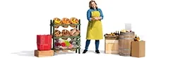 Profile of a shopkeeper next to her basket of goods.